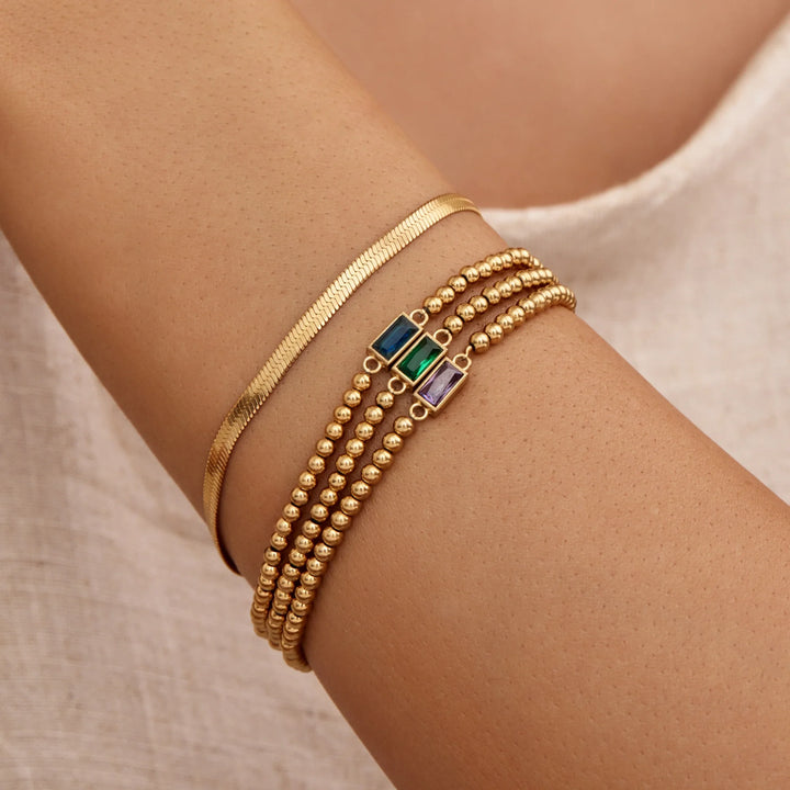 GOLDPERLENARMBAND MIT GEBURTSSTEINEN